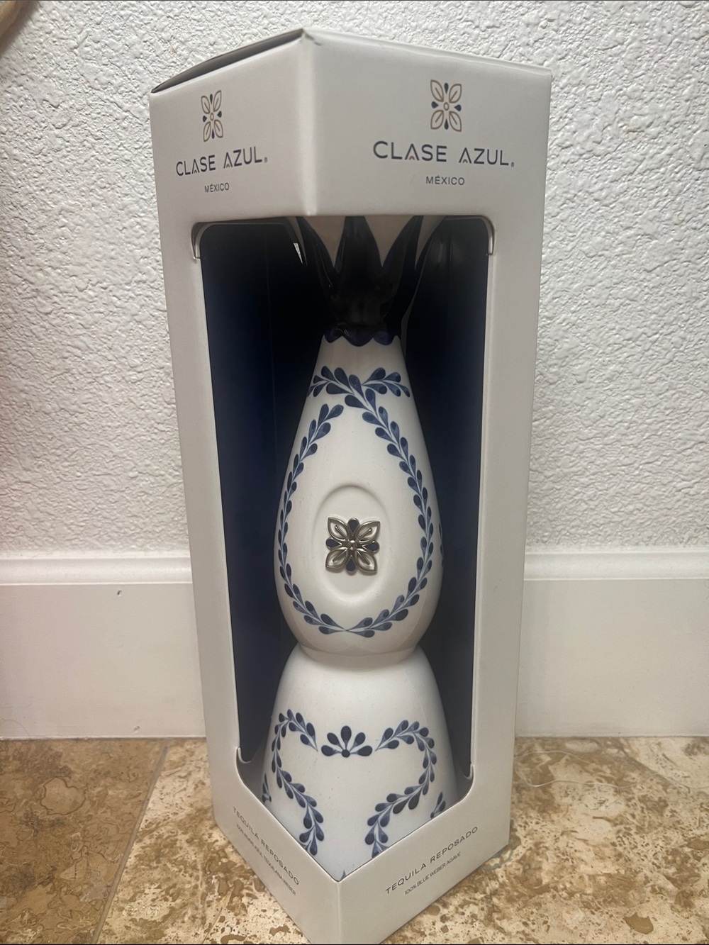 White Ceramic Accent Vase with Blue Floral Motif